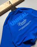 تیشرت باکسی مدل UNREAL رنگ آبی شالی کد 251